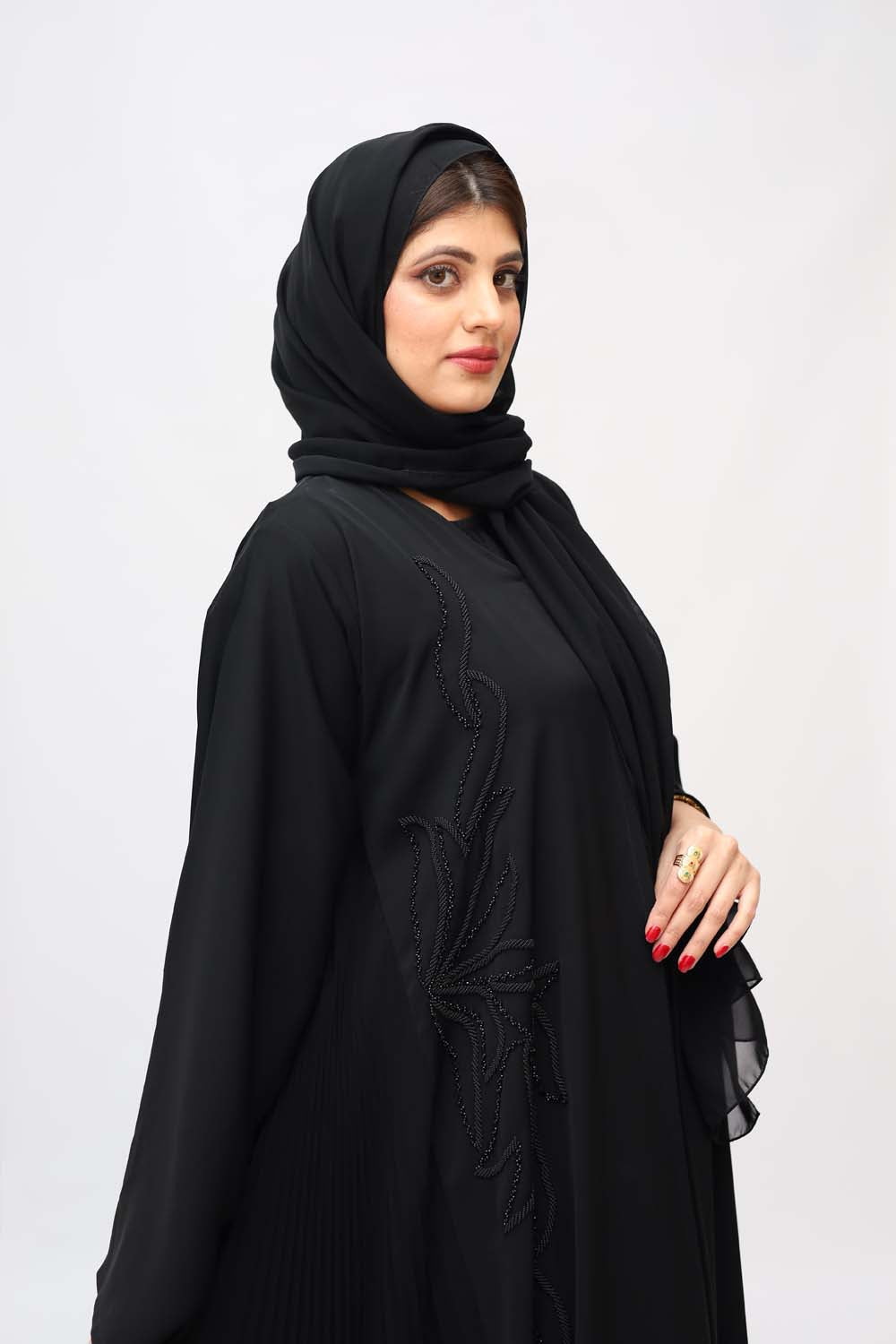 "Elegant Black Handmade Nida Abaya showcased on a 5.6 feet model, highlighting meticulous craftsmanship and timeless style."