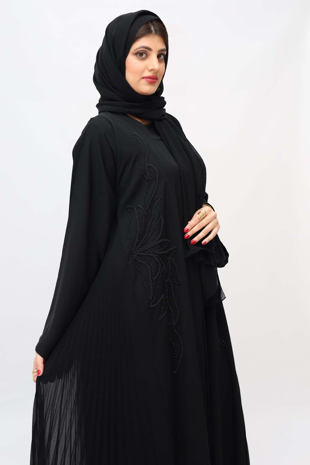 "Elegant Black Handmade Nida Abaya showcased on a 5.6 feet model, highlighting meticulous craftsmanship and timeless style."