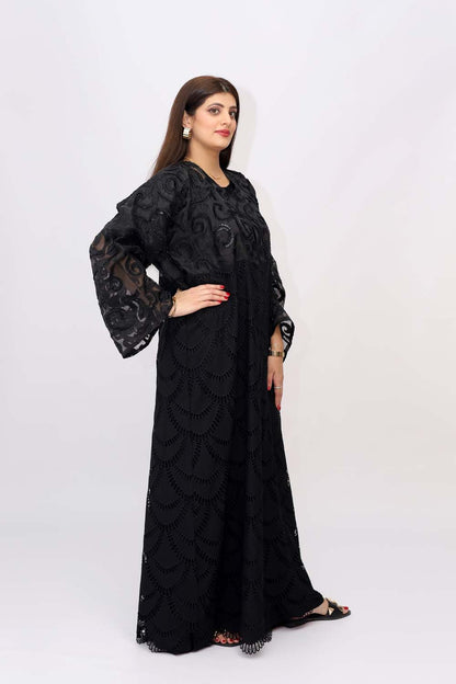 "Elegant Chickenkari Net Style Abaya showcased on a 5.6 feet model, featuring feminine embroidery and a tailored fit. Model wears size 56."