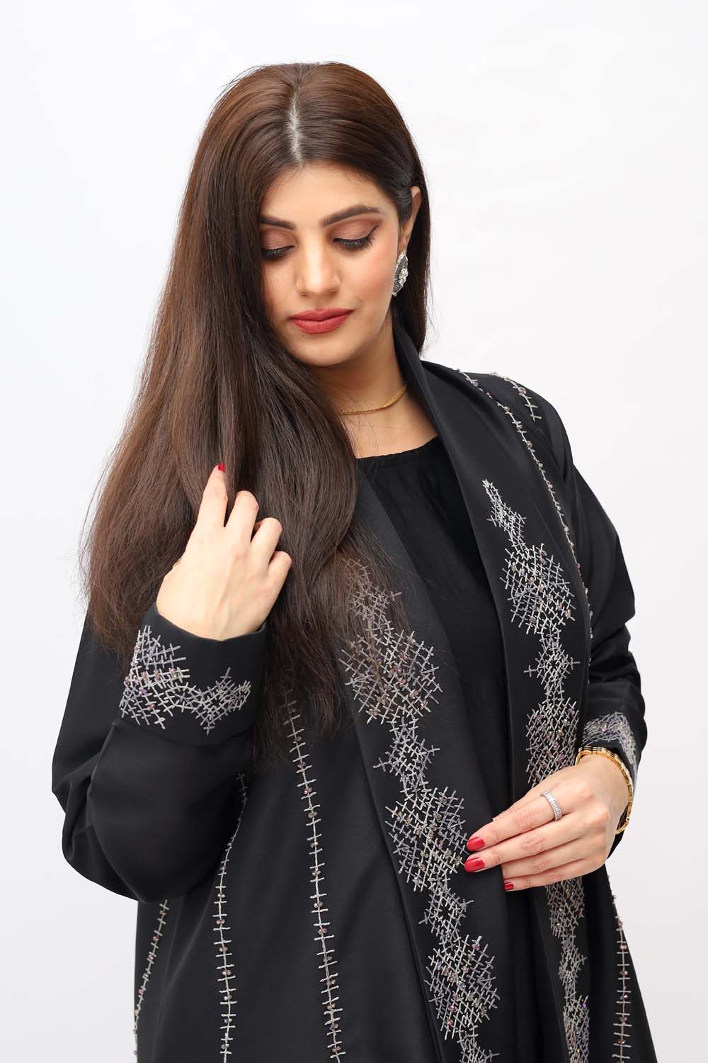 "Elegant Handmade Embroidery Abaya in winter mix fabric, showcased on a 5.6 feet model. Classic design with intricate details for a stylish and warm winter look."