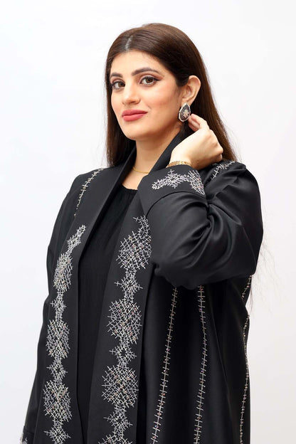 "Elegant Handmade Embroidery Abaya in winter mix fabric, showcased on a 5.6 feet model. Classic design with intricate details for a stylish and warm winter look."