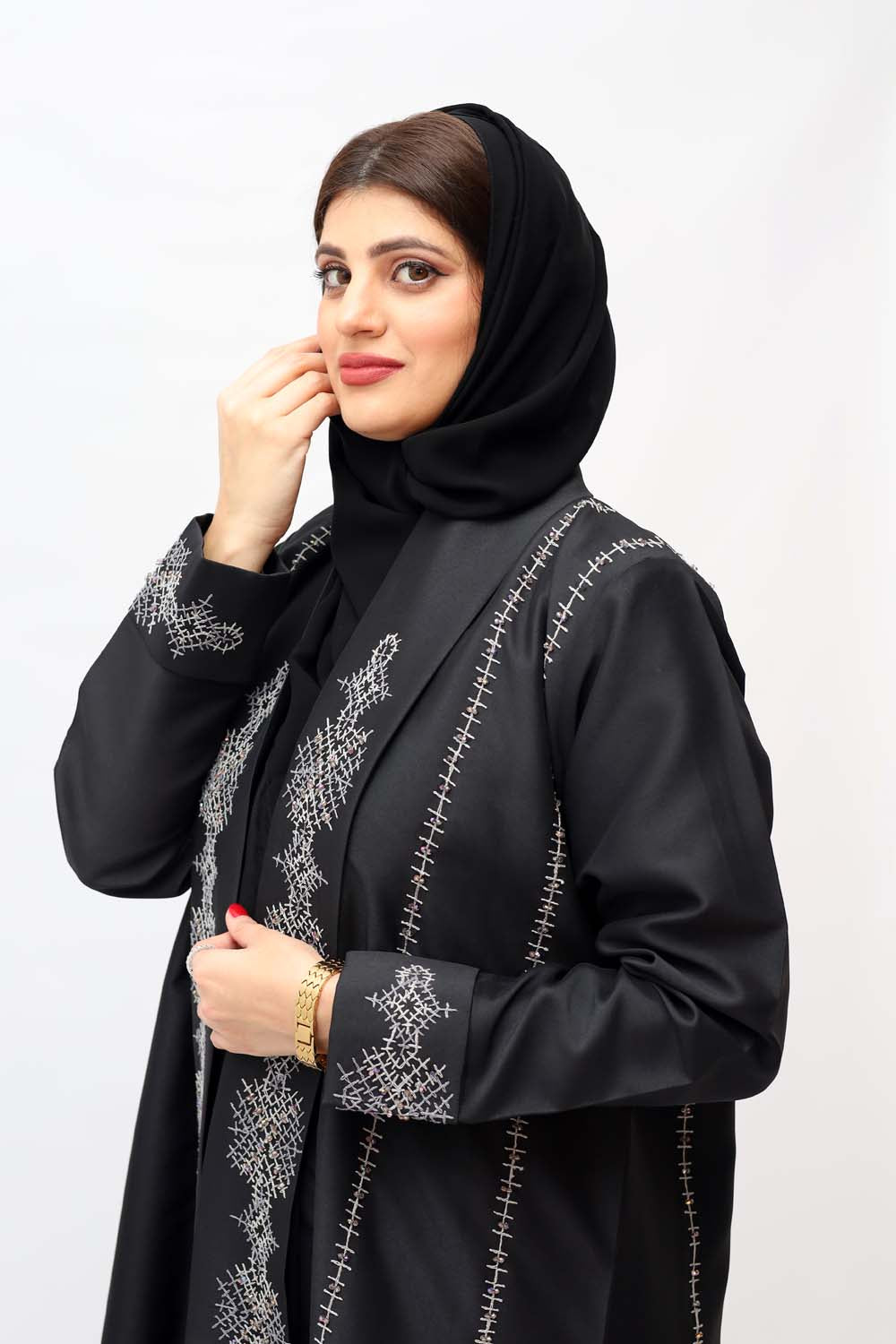 "Elegant Handmade Embroidery Abaya in winter mix fabric, showcased on a 5.6 feet model. Classic design with intricate details for a stylish and warm winter look."